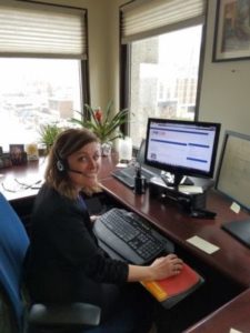 Ashley at her desk