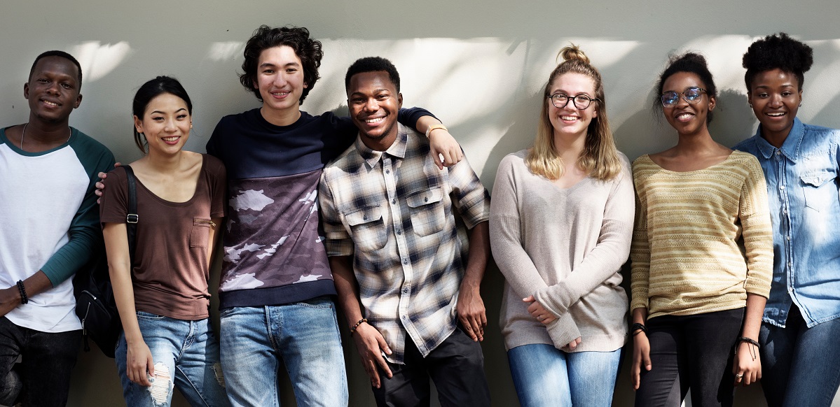 multi ethnic youth smiling at camera