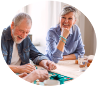 Older adults reviewing documents at a table