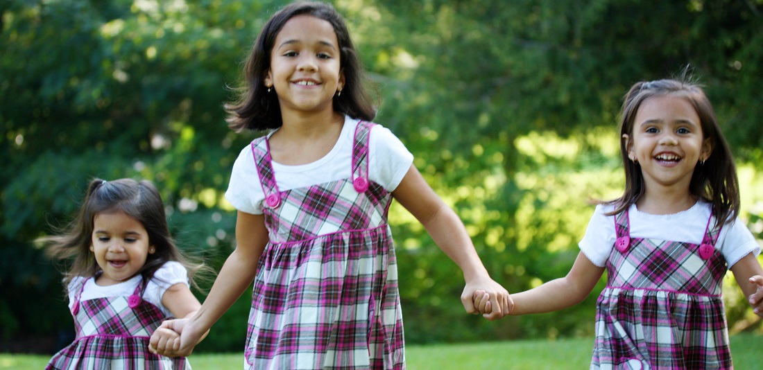 three girls walking