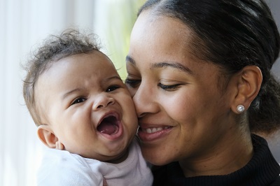 woman holding baby