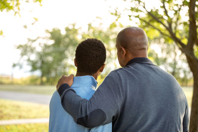 Father and son outside