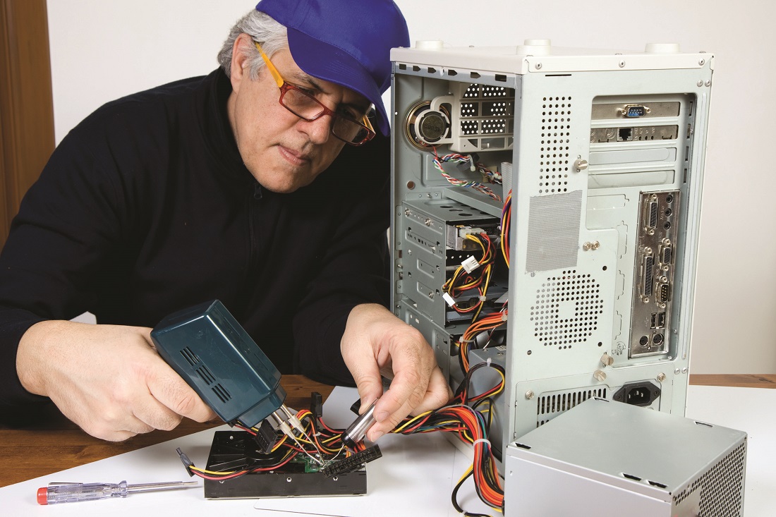 Man fixing computer