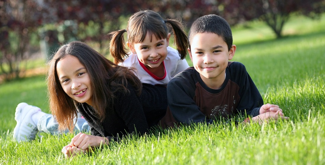 children playing on grass