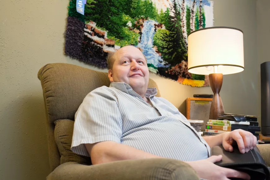 Jeff sitting in his living room.