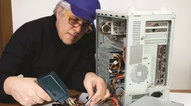 Man fixing computer