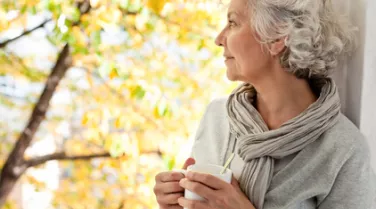 woman holding mug